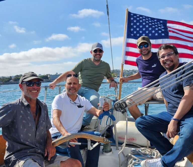 A group of friends on a private sailing charter in San Diego