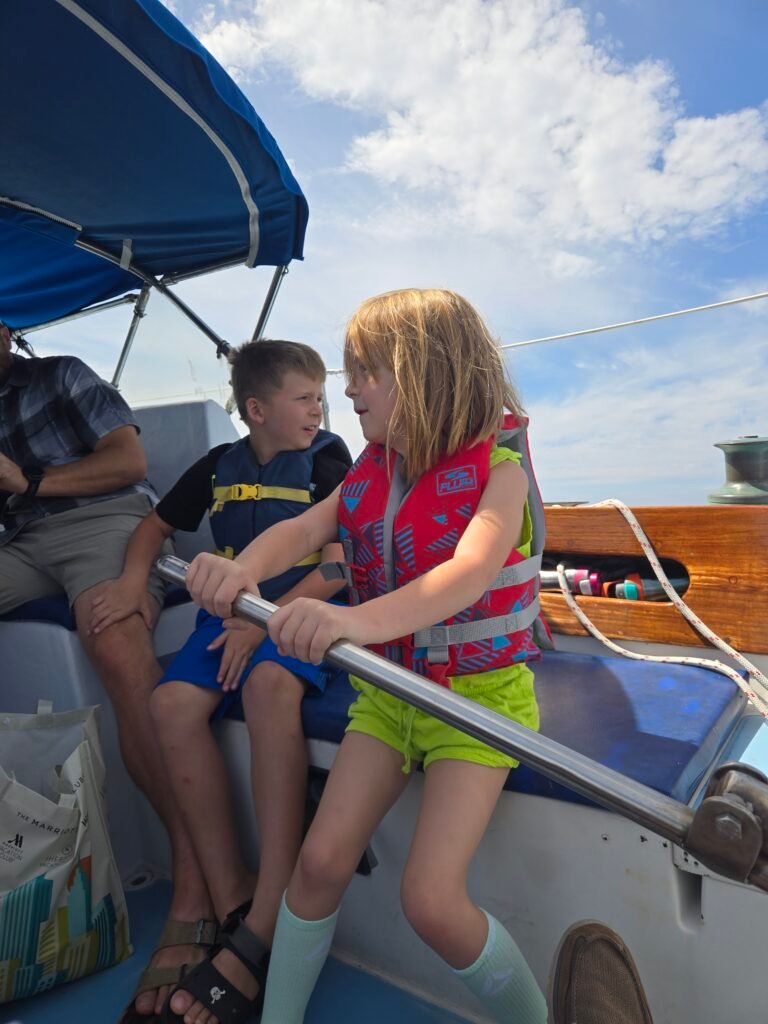 Family sailing aboard Wolf